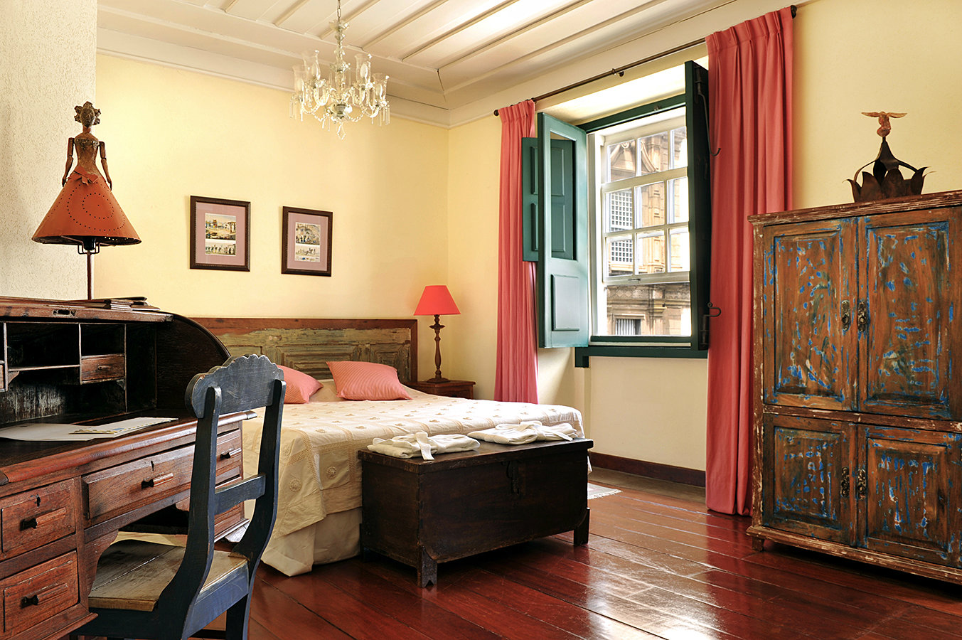 A double-bed room. Each room has a unique size and decoration.