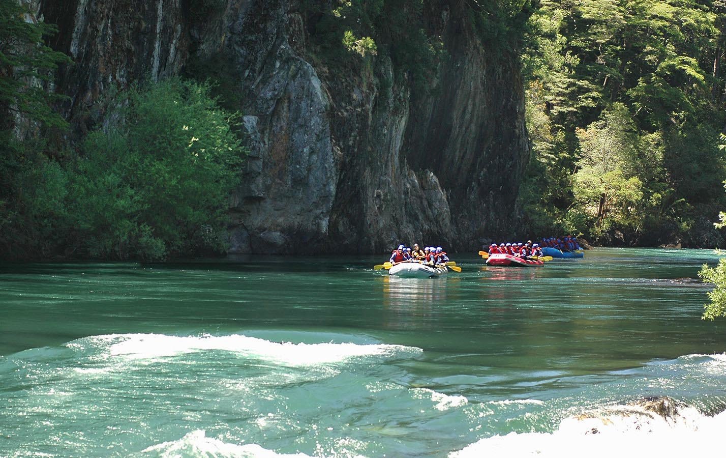 Navigating though the emerald-green waters of Manso River