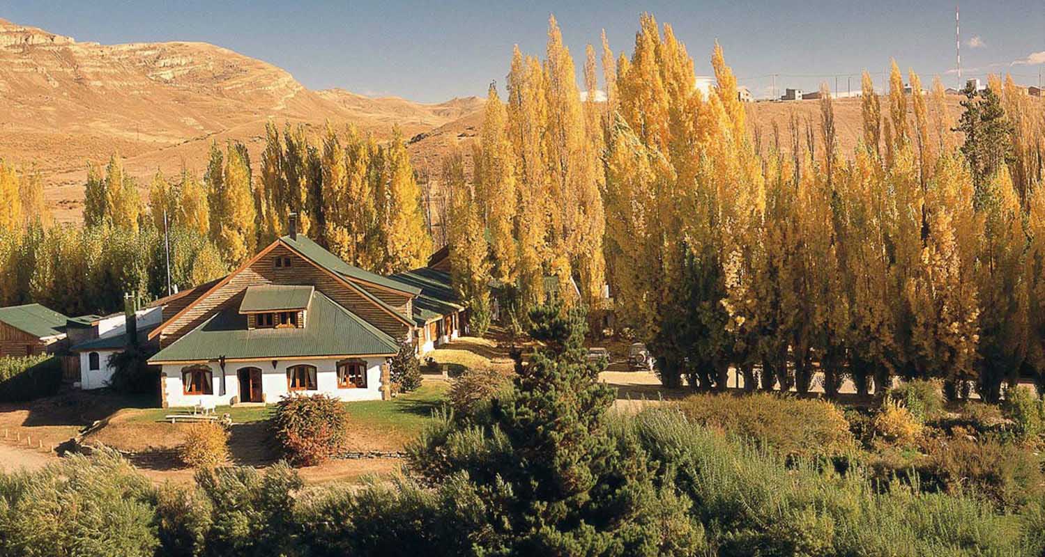 The beautiful Estancia 25 de Mayo, with the backdrop of lush tree and scenic mount