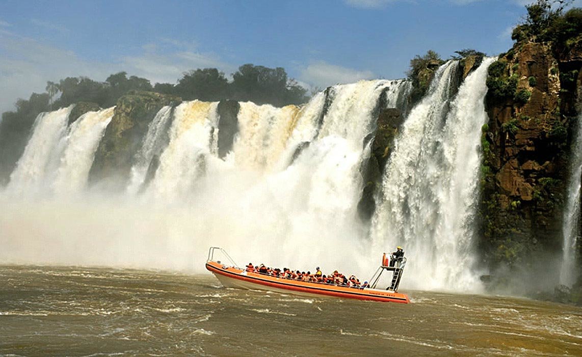 The adventurous speedboat ride provides up-close views of San Martin and Three Musketeers falls