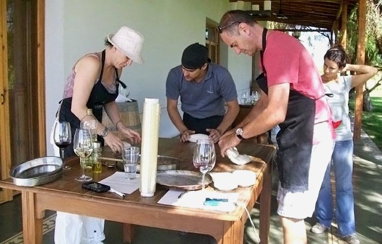 Step into the role of chef, as you enjoy a delightful cooking class and wine tasting experience[1]