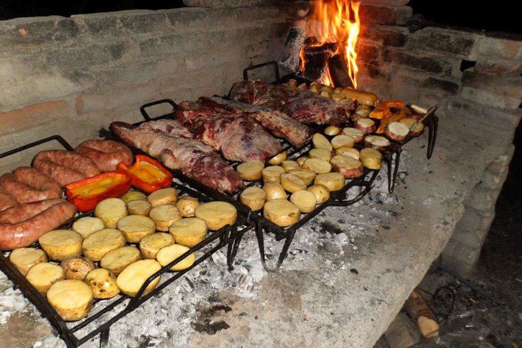 We&rsquo;ll enjoy a delicious dinner of asado (meat barbecue) with wine