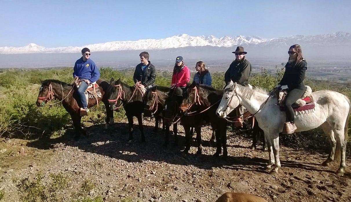 Horseback ride in Mendoza with the snow-capped Andes as a beautiful backdrop
